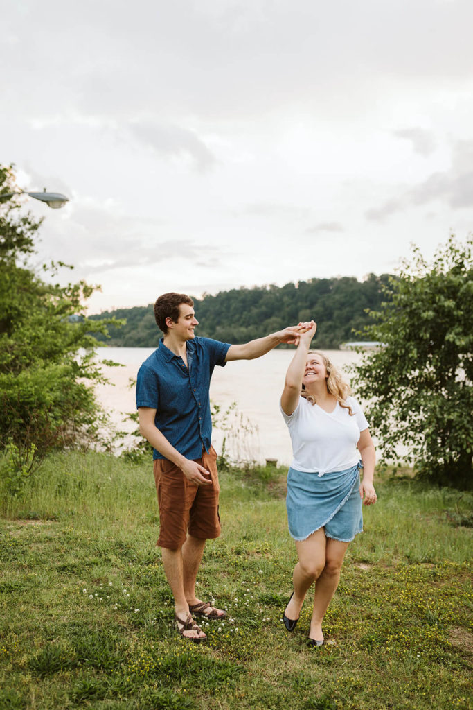 Engagement session in the Riverwalk in Chattanooga by the river. Photo by OkCrowe Photography.