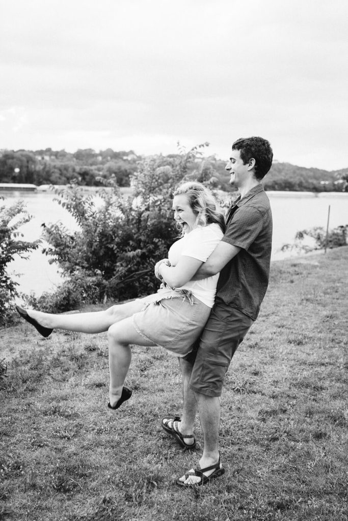 Engagement session in the Riverwalk in Chattanooga by the river. Photo by OkCrowe Photography.