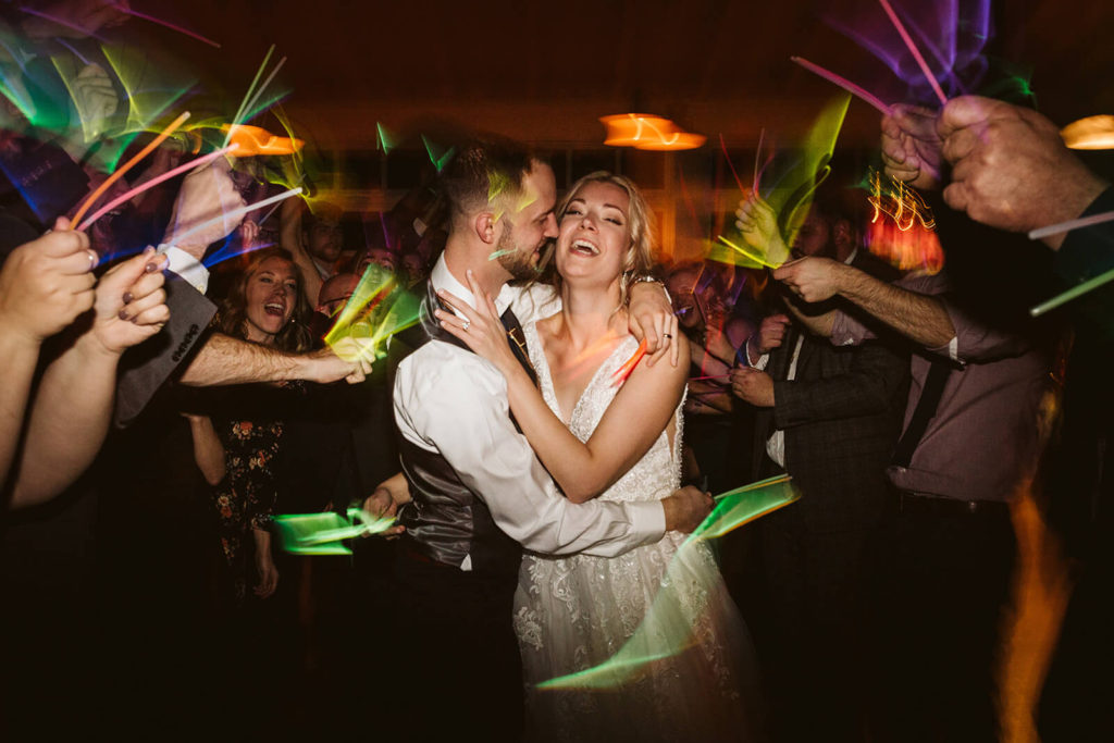 Examples of glow sticks wedding send offs. Photo by OkCrowe Photography.