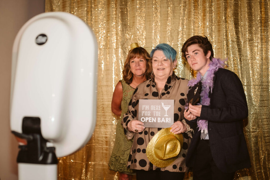The OkCrowe Photo Booth in action during weddings and events. Photo by OkCrowe.