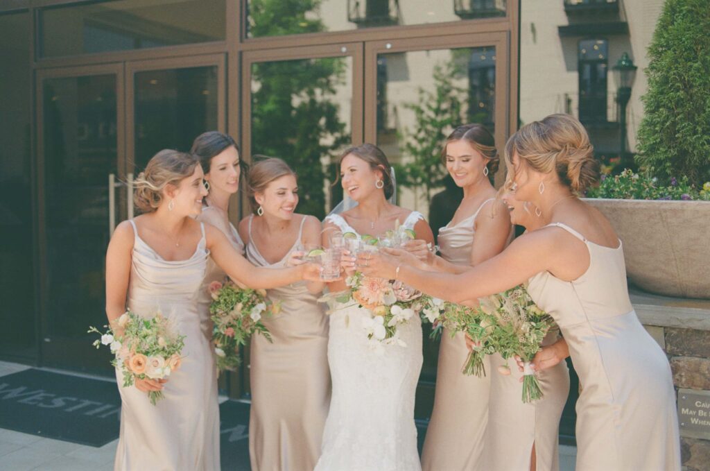 Bride and bridesmaids portraits at the Westin Hotel in Chattanooga's West Village. Photo by OkCrowe Photography.