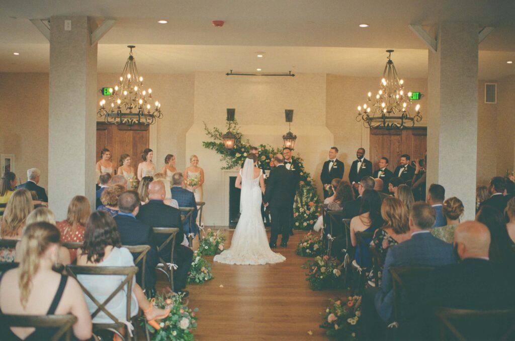 Wedding ceremony at Gilman Event Hall in Chattanooga's West Village. Photo by OkCrowe Photography.