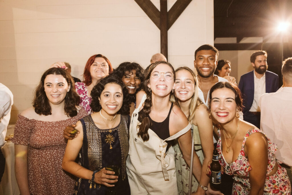 Wedding reception and dancing in the rain at the Hidden Springs Venue. Photo by OkCrowe Photography.