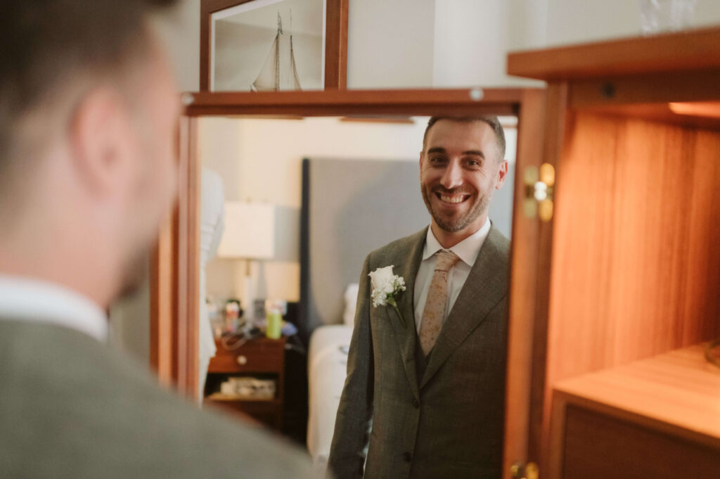 Groom and groomsmen getting ready at Portland Harbor Hotel. Photo by OkCrowe Photography.