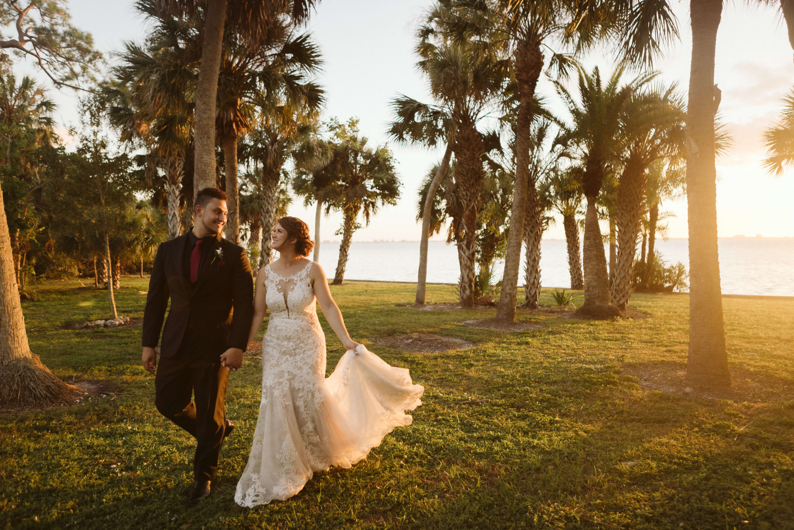 Oceanfront newlywed portraits at the Powel Crosley Estate in Sarasota, Florida. Photo by OkCrowe Photography.