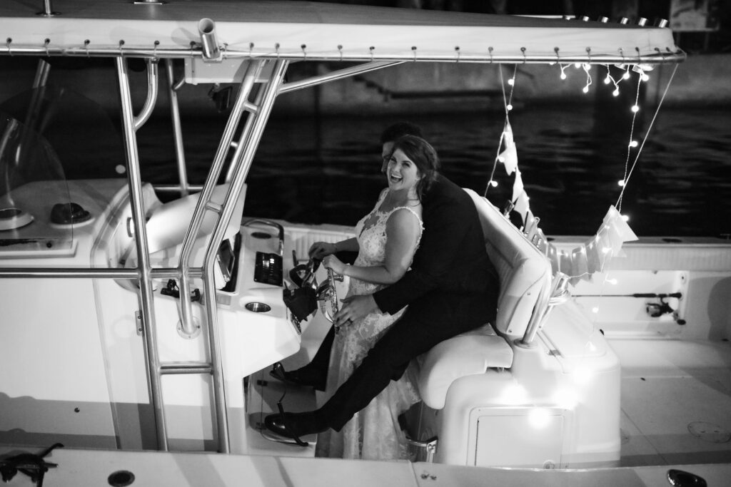 Newlyweds' last dance and send off to their getaway boat at the Powel Crosley Estate in Sarasota, Florida. Photo by OkCrowe Photography. 