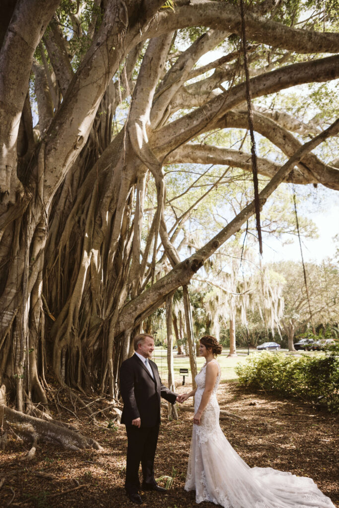 Bride and her father first look at the Powel Crosley Estate in Sarasota, Florida. Photo by OkCrowe Photography. 