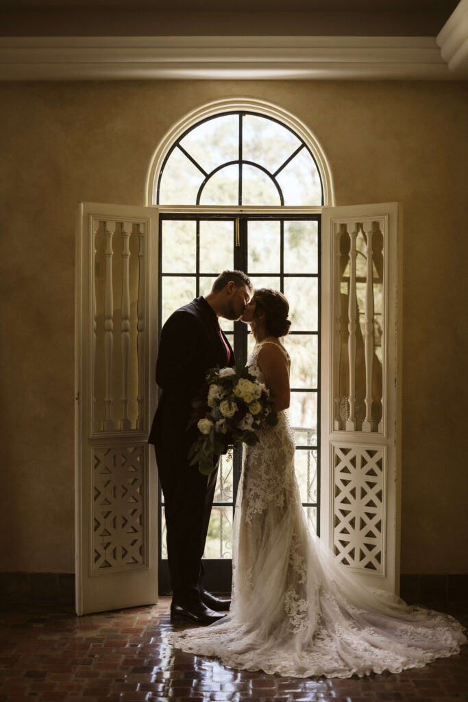 Bride and groom portraits at the Powel Crosley Estate in Sarasota, Florida. Photo by OkCrowe Photography. 
