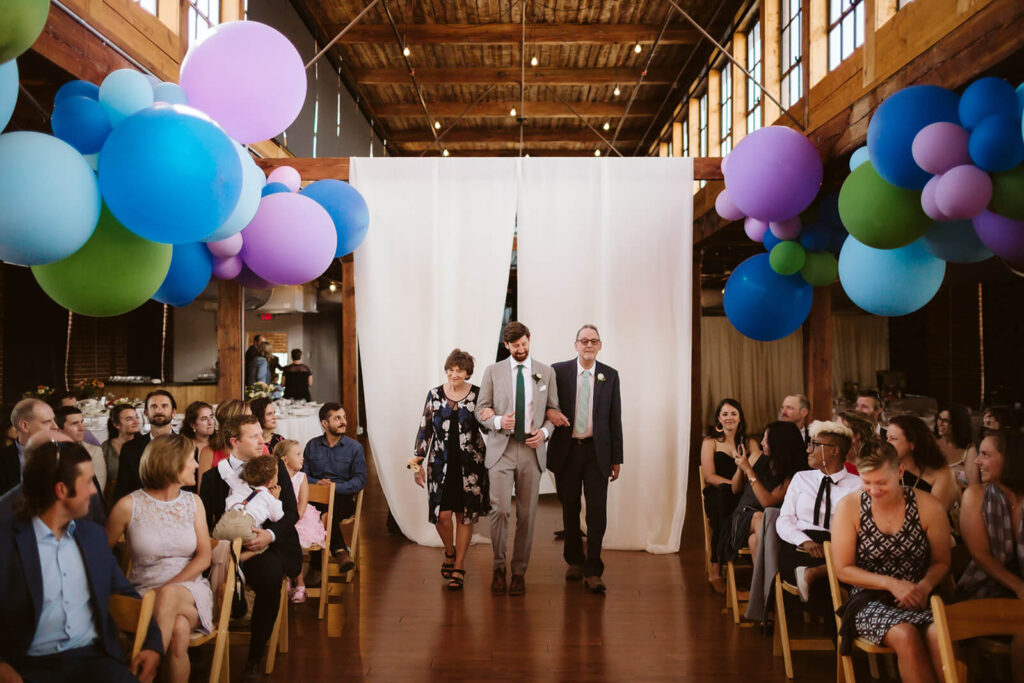 Weddings featuring the Turnbull Building's spacious fourth floor event space. Photo by OkCrowe Phtography.