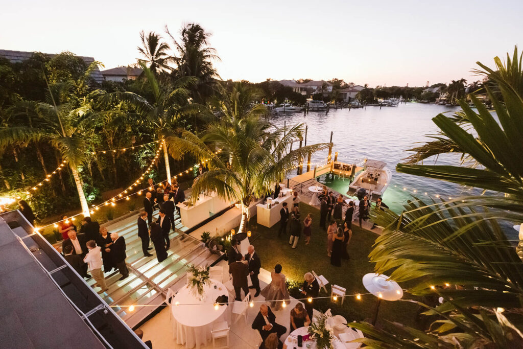 Backyard wedding reception in a private family home in Sarasota, Florida. Photo by OkCrowe Photography.