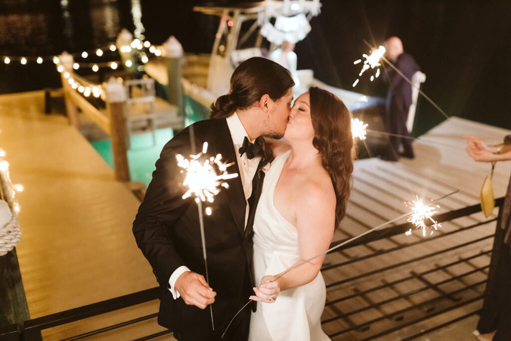 Sparkler send off to a getaway boat in Sarasota, Florida. Photo by OkCrowe Photography.