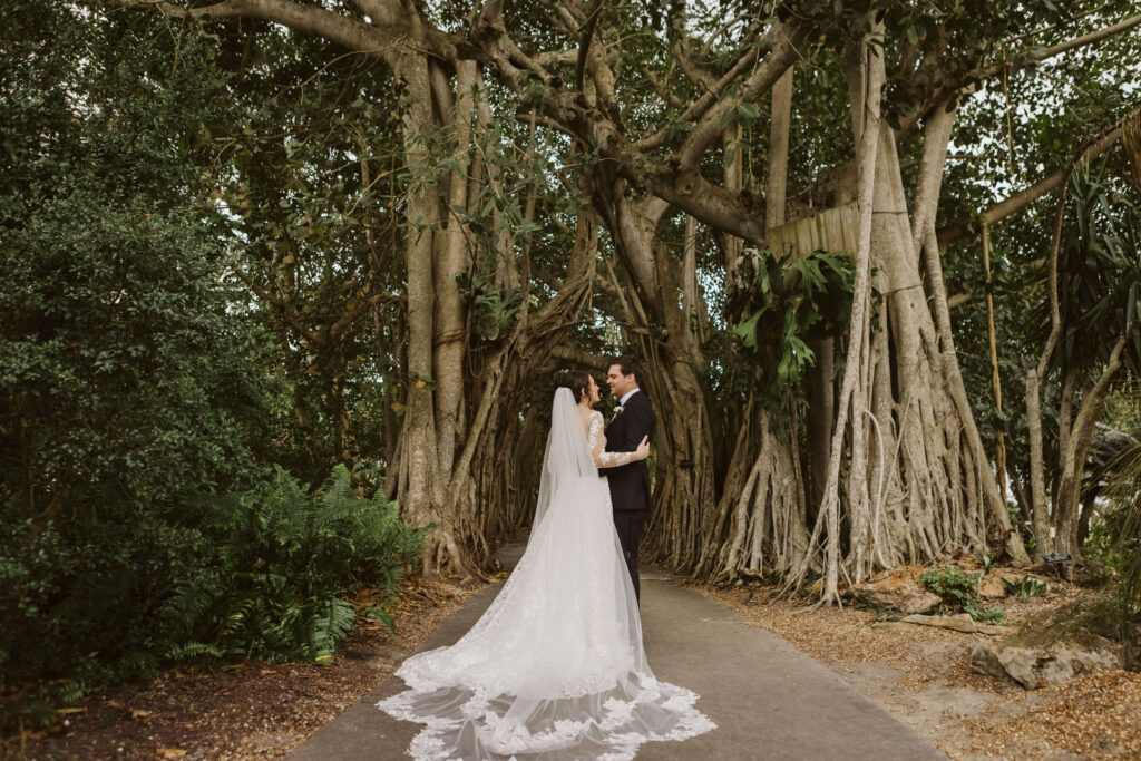 Bride and groom portraits at the Marie Selby Botanic Gardens in Sarasota, Florida. Photo by OkCrowe Photography.