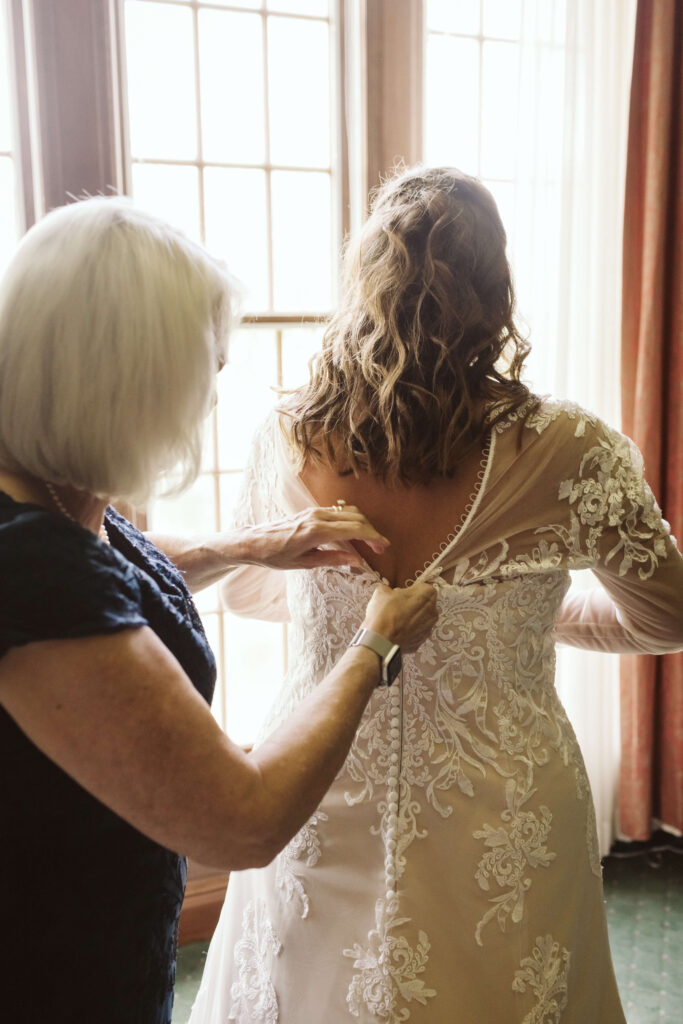 Bride getting ready for a wedding at the Baylor School in Chattanooga. Photo by OkCrowe Photography.