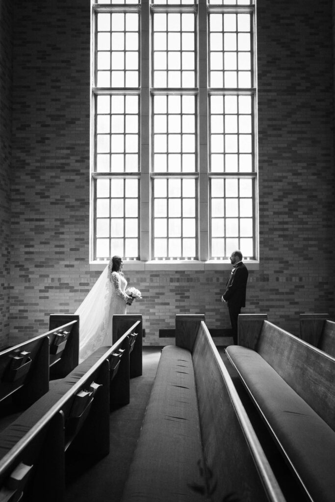 Bride and groom portraits in the Alumni Chapel of the Baylor School in Chattanooga. Photo by OkCrowe Photography.