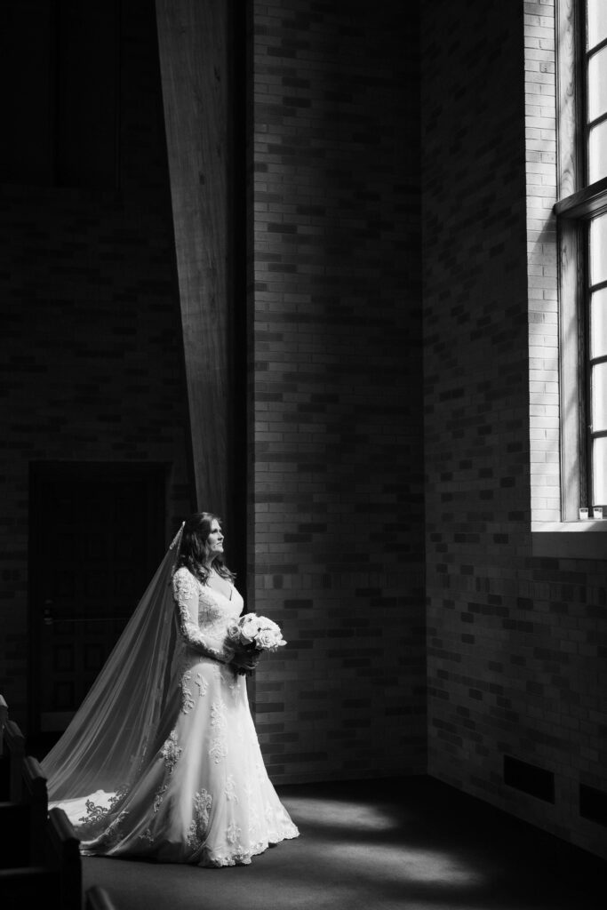 Bride portraits in the Alumni Chapel of the Baylor School in Chattanooga. Photo by OkCrowe Photography. 