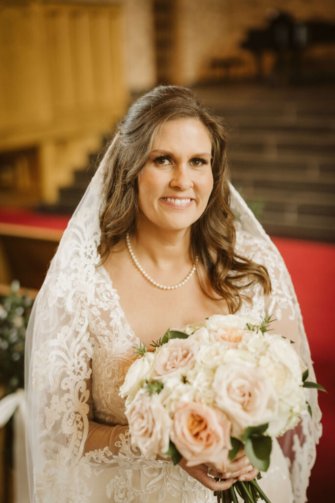 Bride portraits in the Alumni Chapel of the Baylor School in Chattanooga. Photo by OkCrowe Photography. 