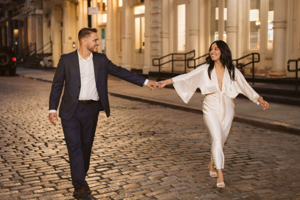 Direct flash photography during an engagement session in SoHo in New York City. Photo by OkCrowe Photography. 