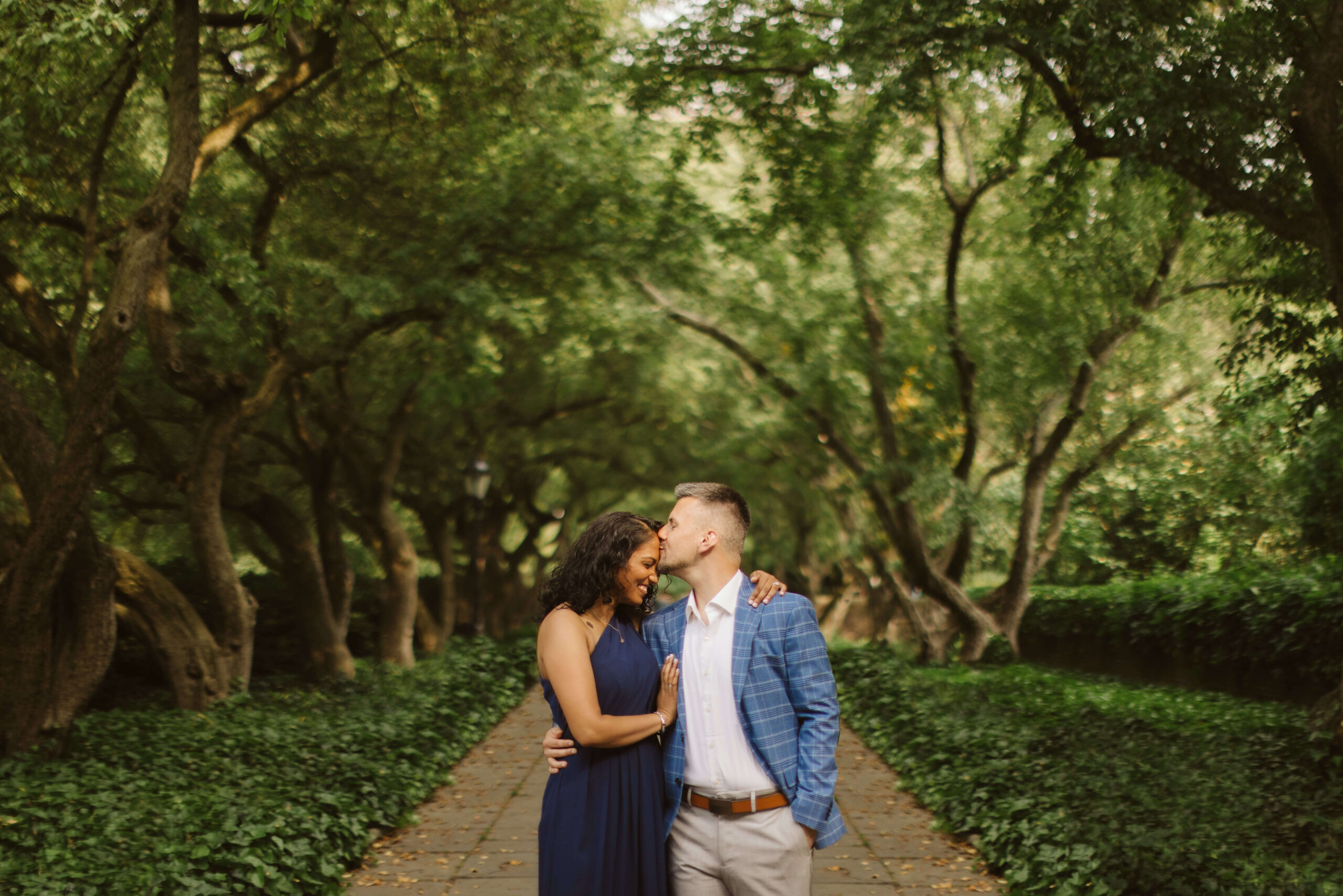 Romantic engagement session in the Central Park Conservatory Gardens in New York City. Photo by OkCrowe Photography.