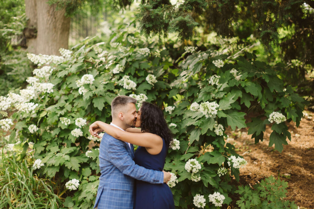 Romantic engagement session in the Central Park Conservatory Gardens in New York City. Photo by OkCrowe Photography.