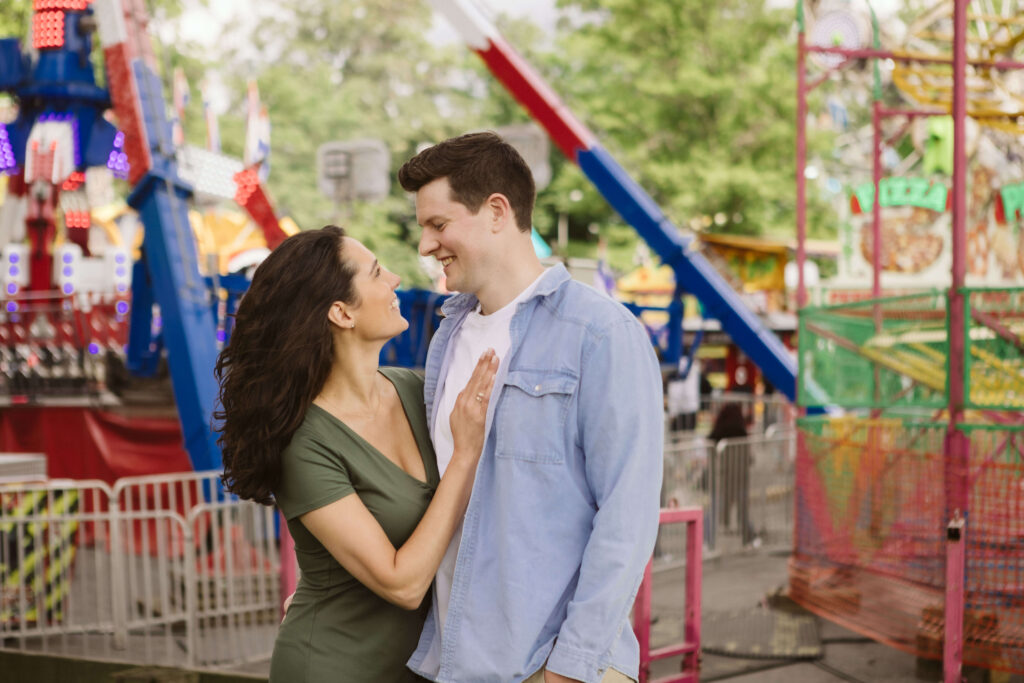 Fun engagement session at the Astoria Park Carnival. Photo by OkCrowe Photography.