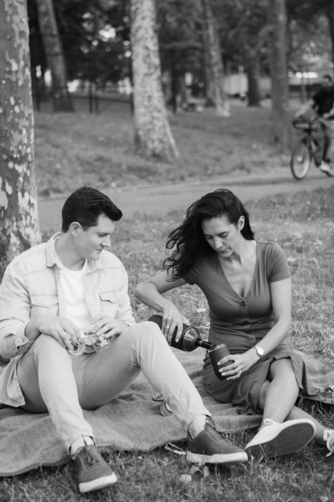 A casual picnic date and engagement session in Astoria Park.  Photo by OkCrowe Photography.