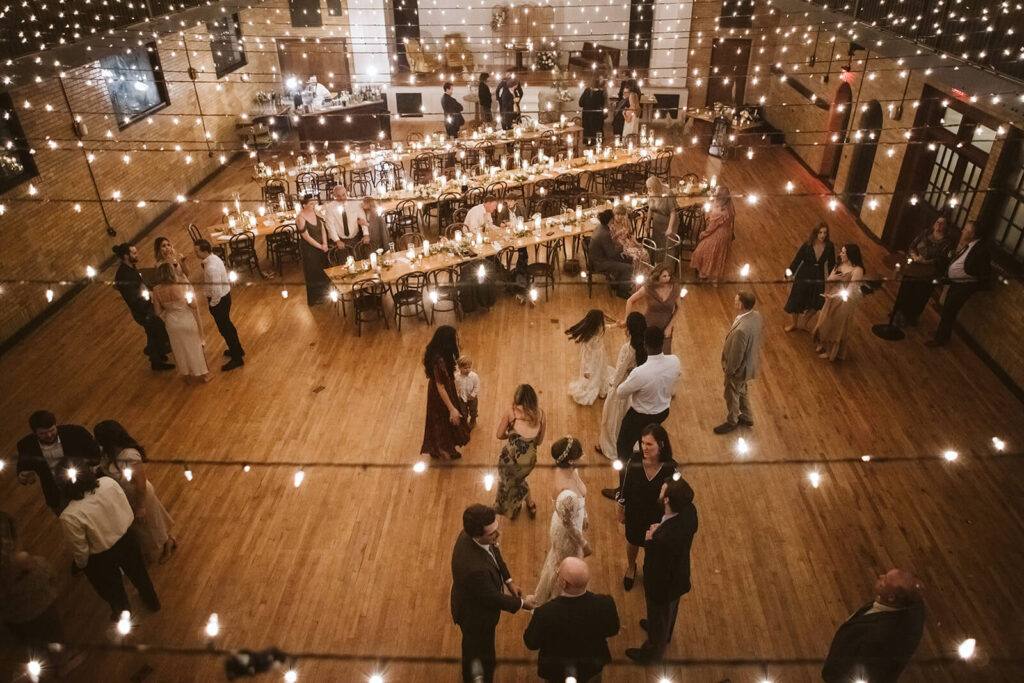 Wedding reception in Ruby Hall at the Common House Chattanooga. Photo by OkCrowe Photography.