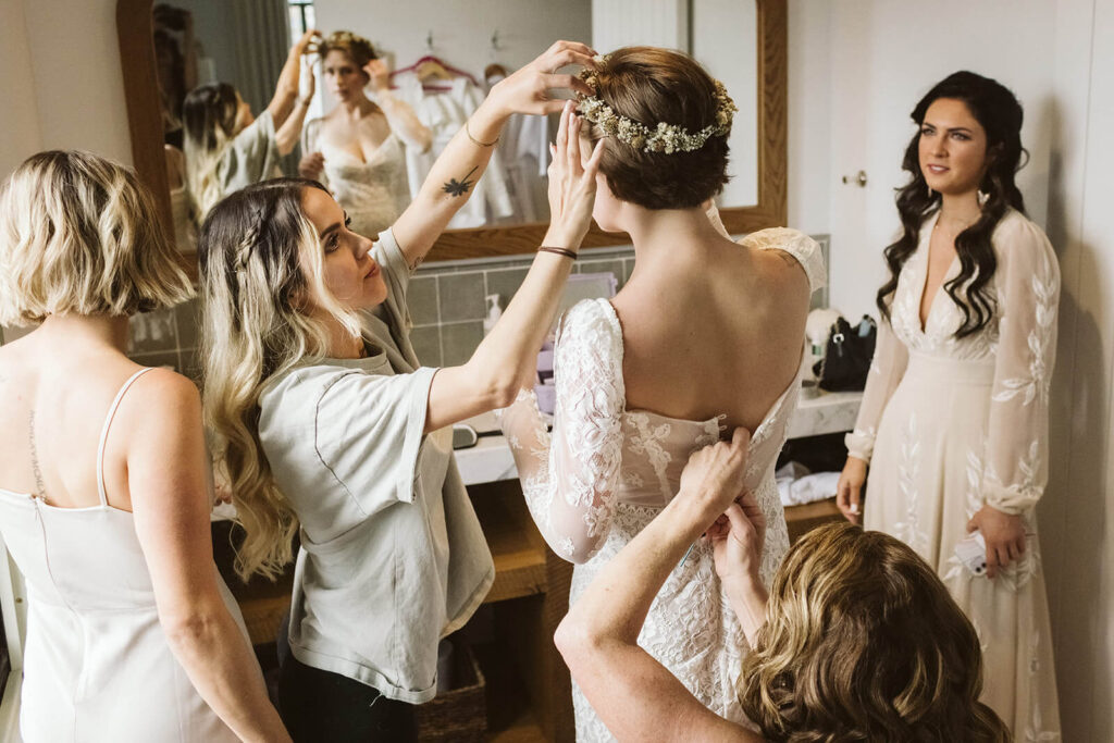 Bride getting ready in the modern bridal suite in the Common House Chattanooga. Photo by OkCrowe Photography.