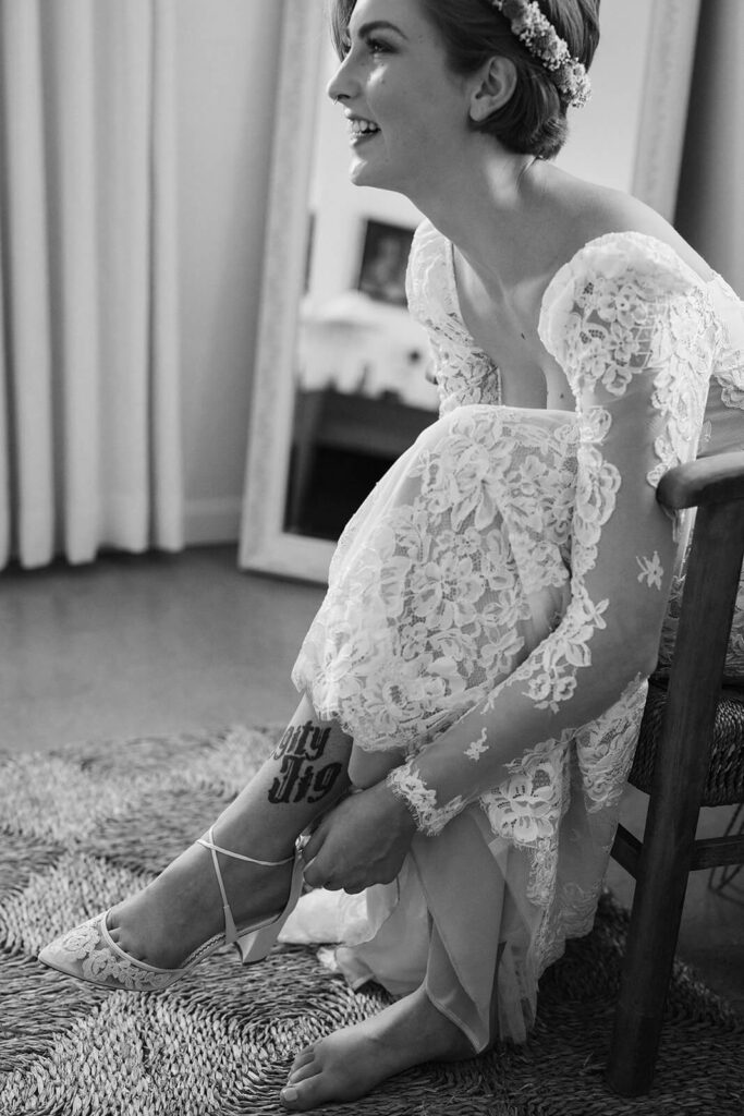 Bride getting ready in the modern bridal suite in the Common House Chattanooga. Photo by OkCrowe Photography.