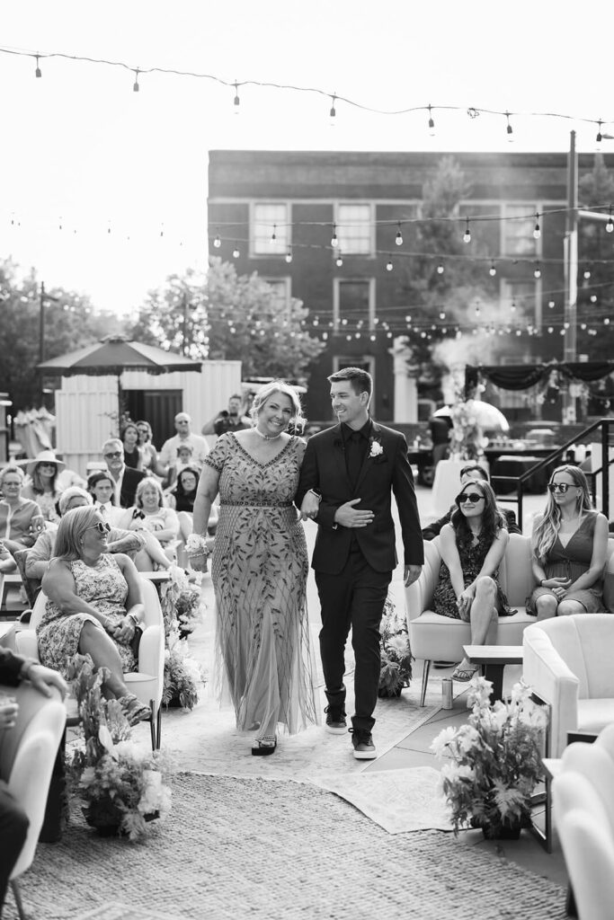 Outdoor wedding ceremony at the Railyard in the Moxy Chattanooga. Photo by OkCrowe Photography.