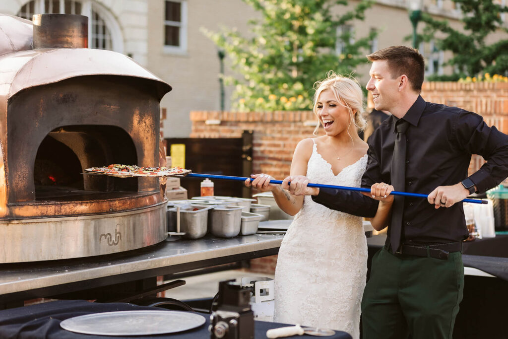 Fun outdoor wedding reception in the Railyard at the Moxy Chattanooga. Photo by OkCrowe Photography.