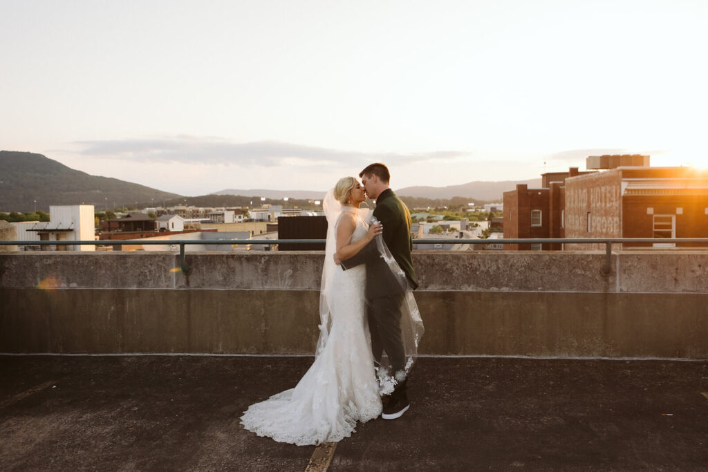 Newlywed portraits on the roof near the Moxy Chattanooga. Photo by OkCrowe Photography.