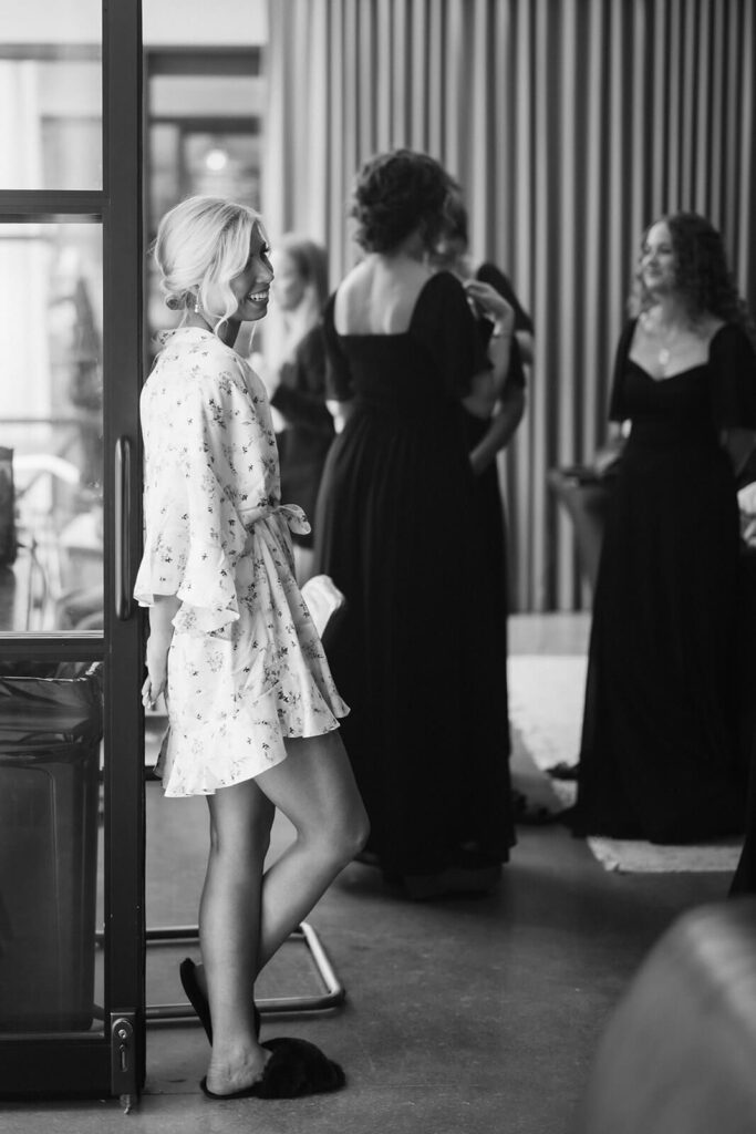 Bride and bridesmaids getting ready at the Moxy Chattanooga. Photo by OkCrowe Photography.