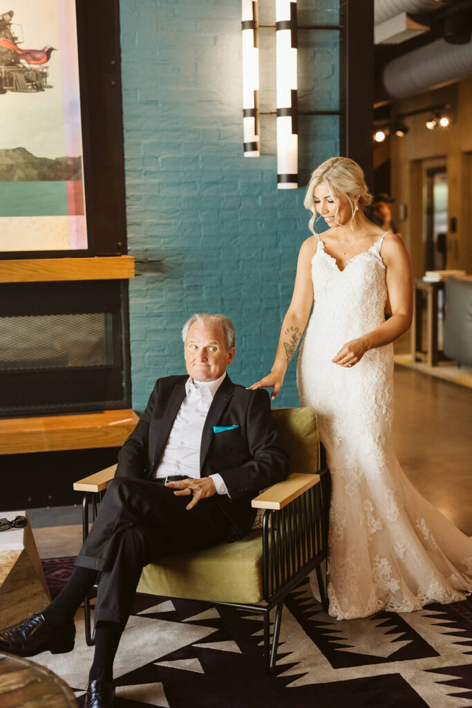 Bride's first look with her stepfather at the Moxy Chattanooga. Photo by OkCrowe Photography.