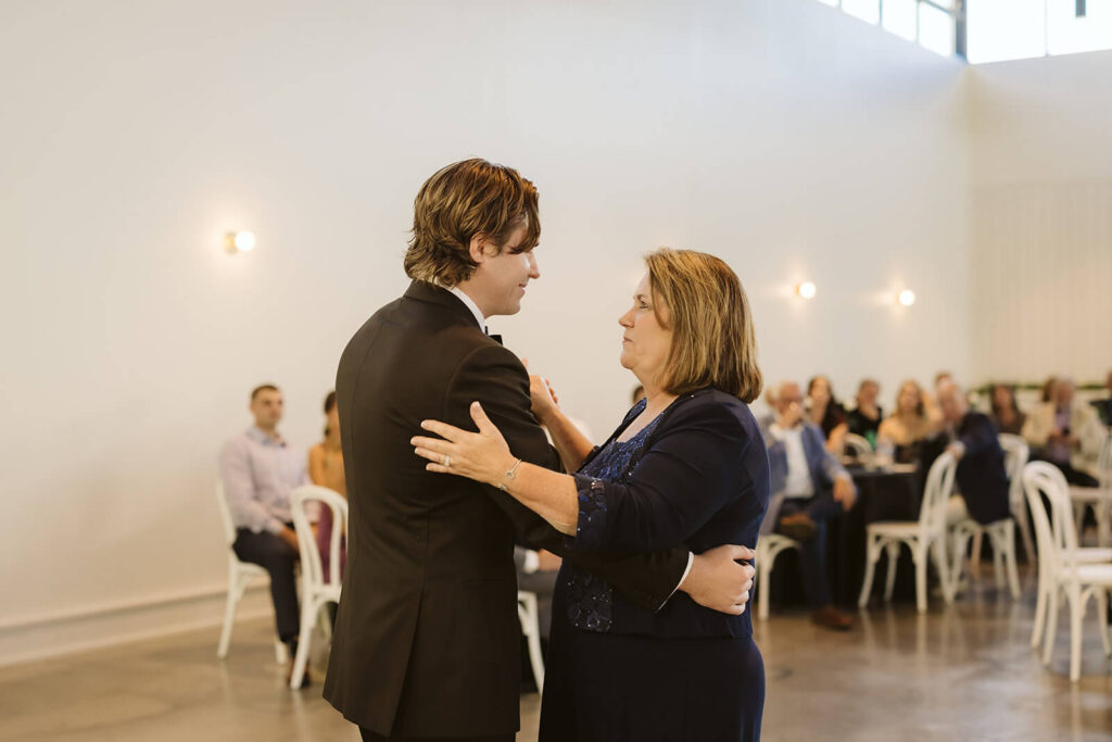 Mother-son dance with groom and his mom at Parkside Hall in Chattanooga. Photo by OkCrowe Photography.