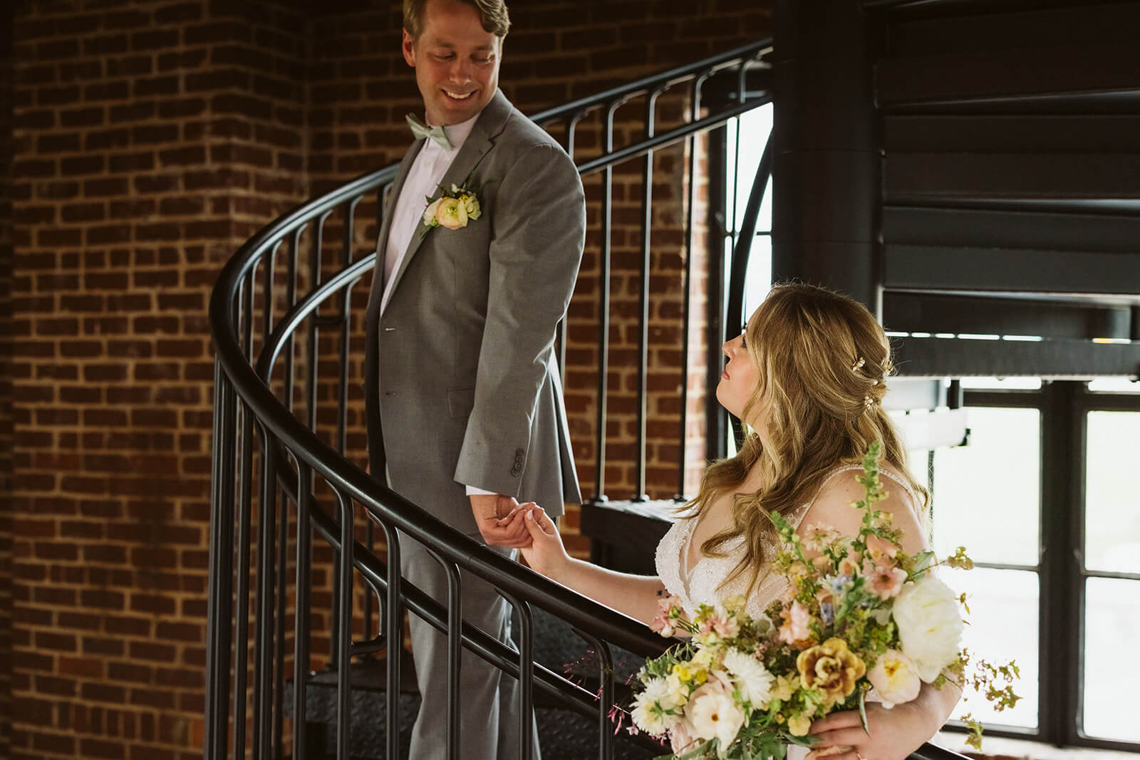 Bride and groom portraits in the Turnbull Building in Chattanooga. Photo by OkCrowe Photography.