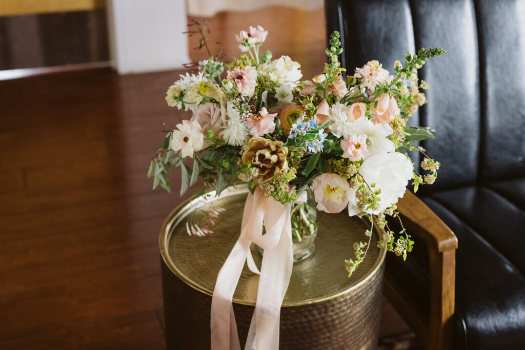 Elegant, spring-themed wedding details at the Turnbull Building in Chattanooga. Photo by OkCrowe Photography.