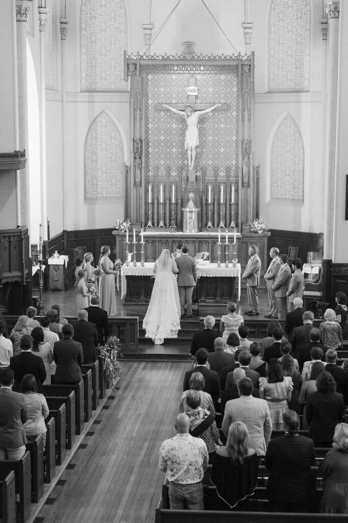 Wedding ceremony at the Basilica of Saints Peter and Paul in Chattanooga. Photo by OkCrowe Photography.