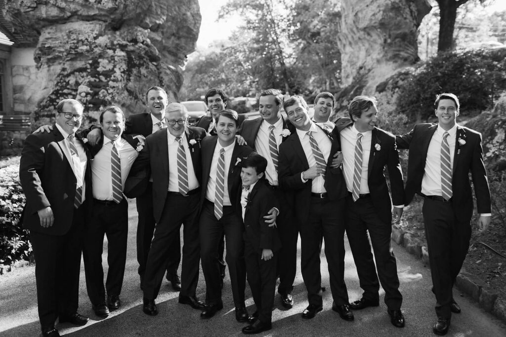 Groom and groomsmen portraits at the Lookout Mountain Fairyland Clubhouse. Photo by OkCrowe Photography. 