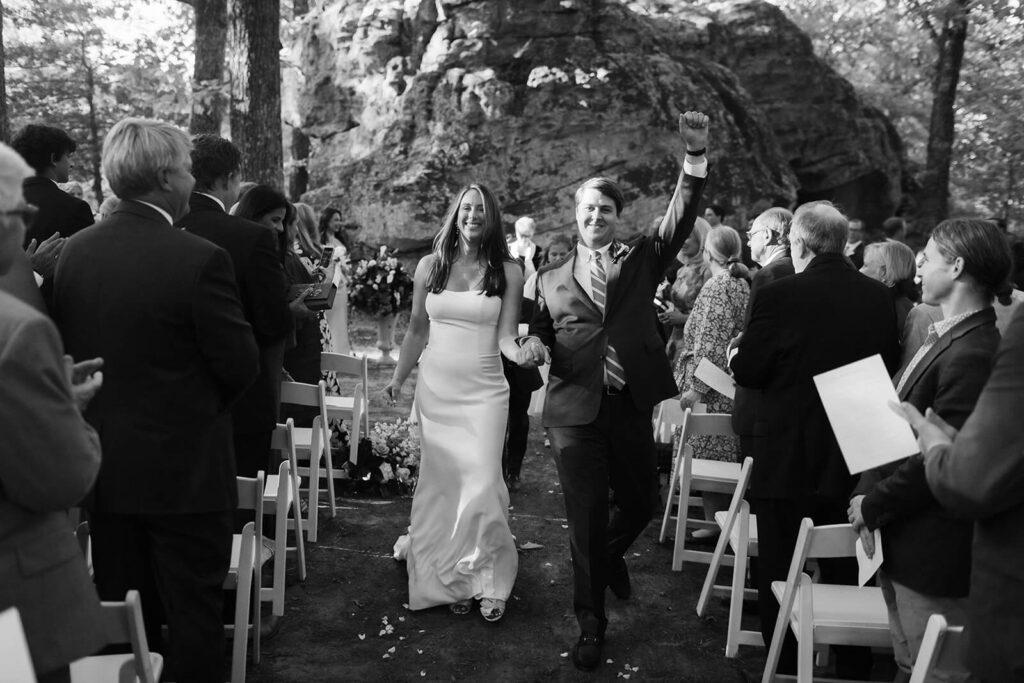 Outdoor wedding ceremony in a rock grotto at the Lookout Mountain Fairyland Clubhouse. Photo by OkCrowe Photography.