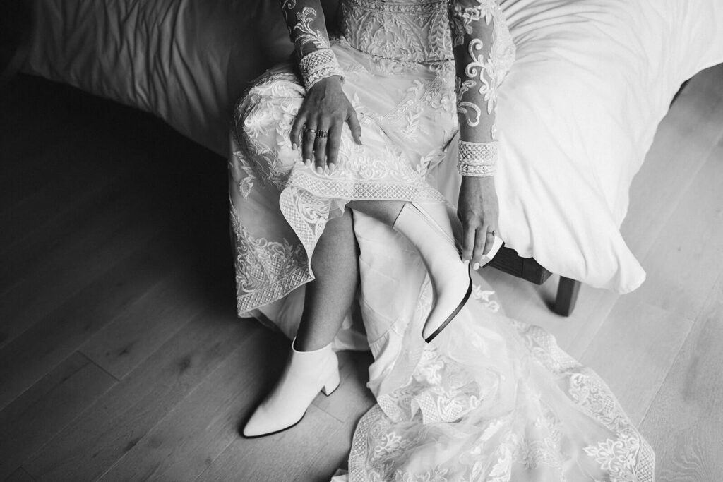 Bride getting ready before a destination elopement in Cannon Beach, Oregon. Photo by OkCrowe Photography. 