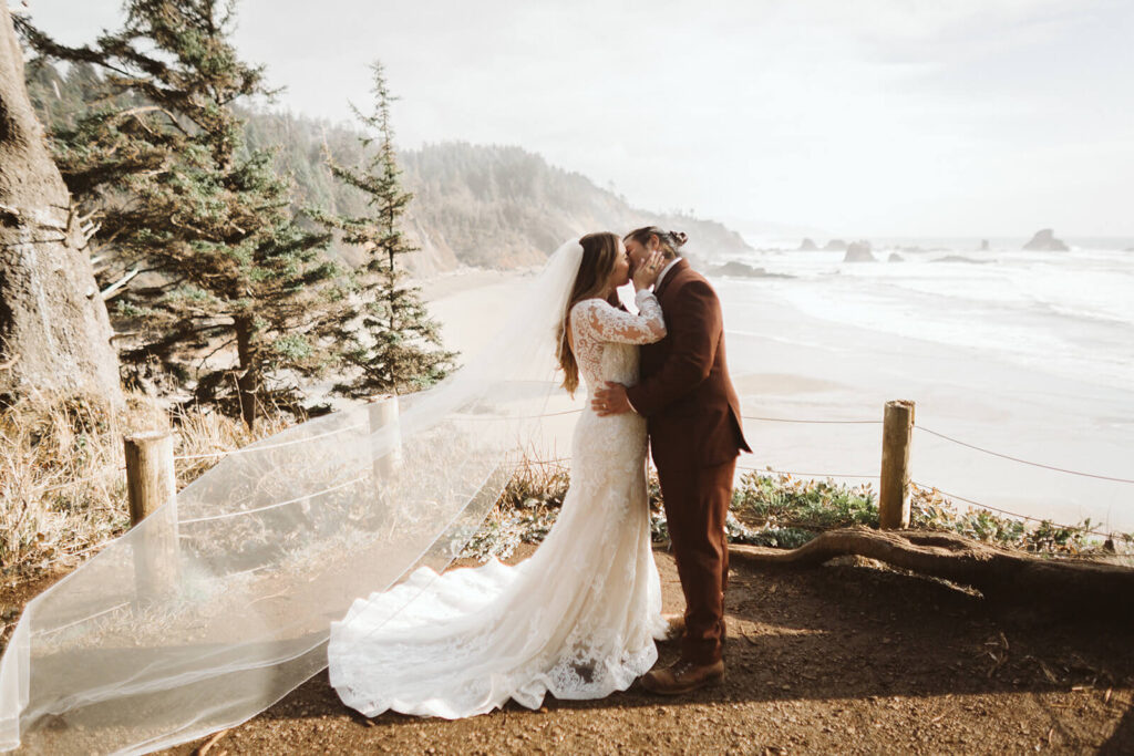 Newlyweds portraits on the Indian Trail Outlook in Ecola Park in Cannon Beach, Oregon. Photo by OkCrowe Photography.