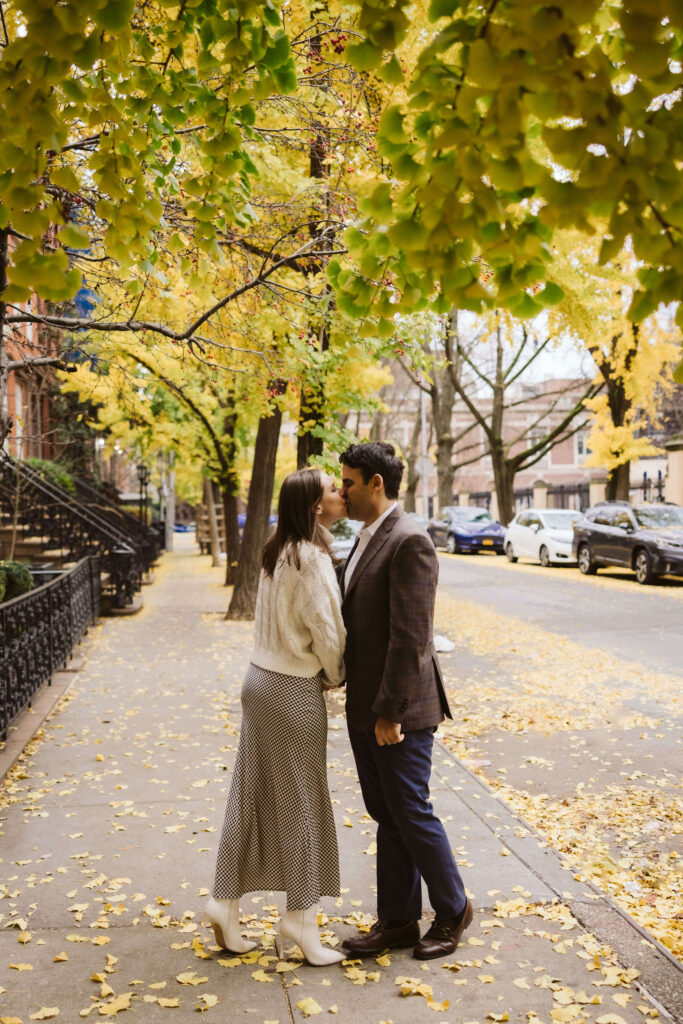 Charming fall engagement session throughout Downtown Manhattan. Photo by OkCrowe Photography.