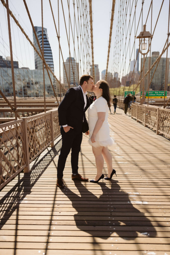 Engagement session on Brooklyn Bridge in DUMBO, NYC. Photo by OkCrowe Photography. 