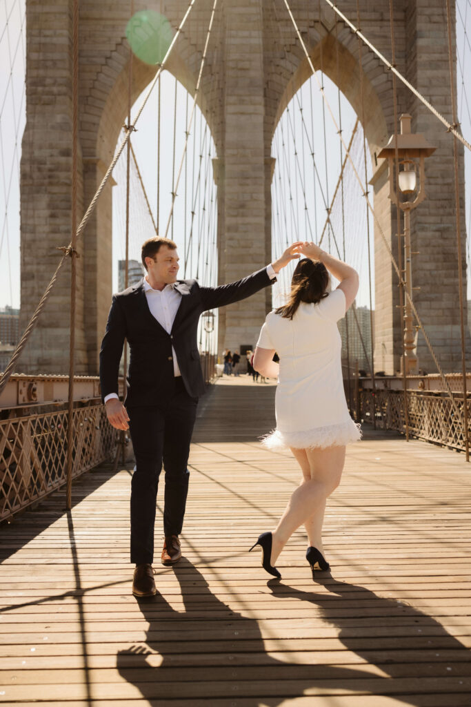 Engagement session on Brooklyn Bridge in DUMBO, NYC. Photo by OkCrowe Photography. 