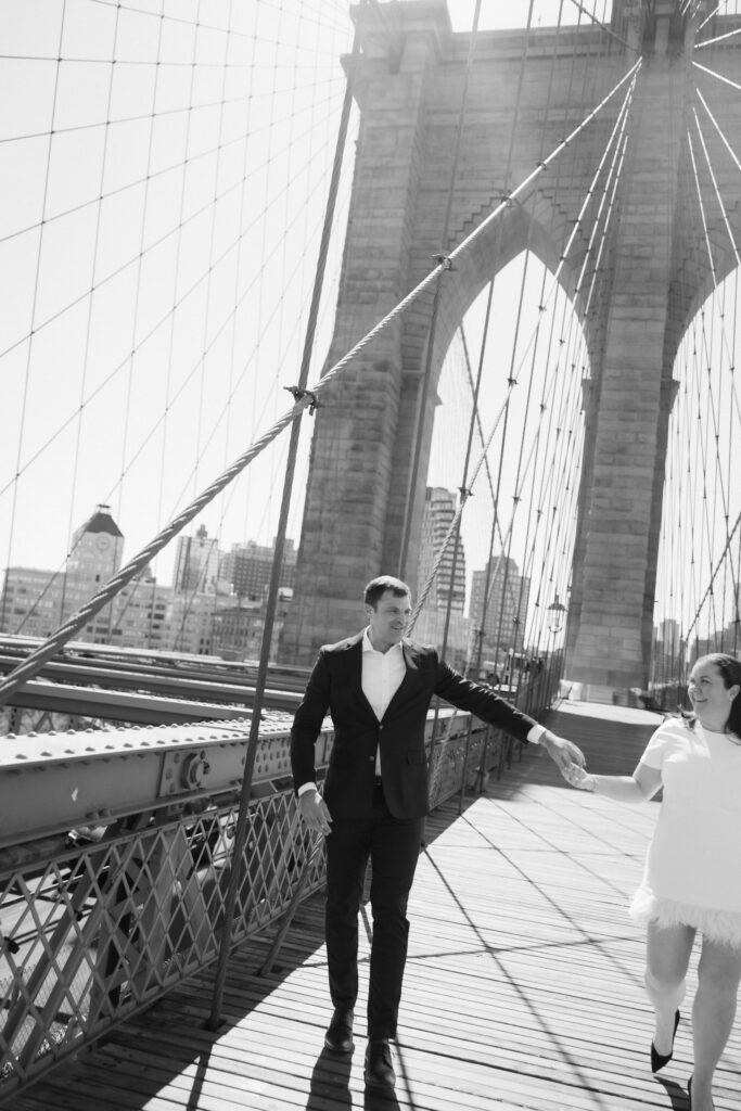 Engagement session on Brooklyn Bridge in DUMBO, NYC. Photo by OkCrowe Photography. 