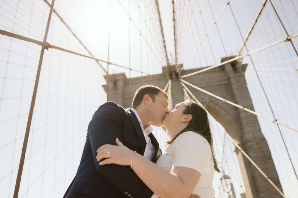 Engagement session on Brooklyn Bridge in DUMBO, NYC. Photo by OkCrowe Photography. 