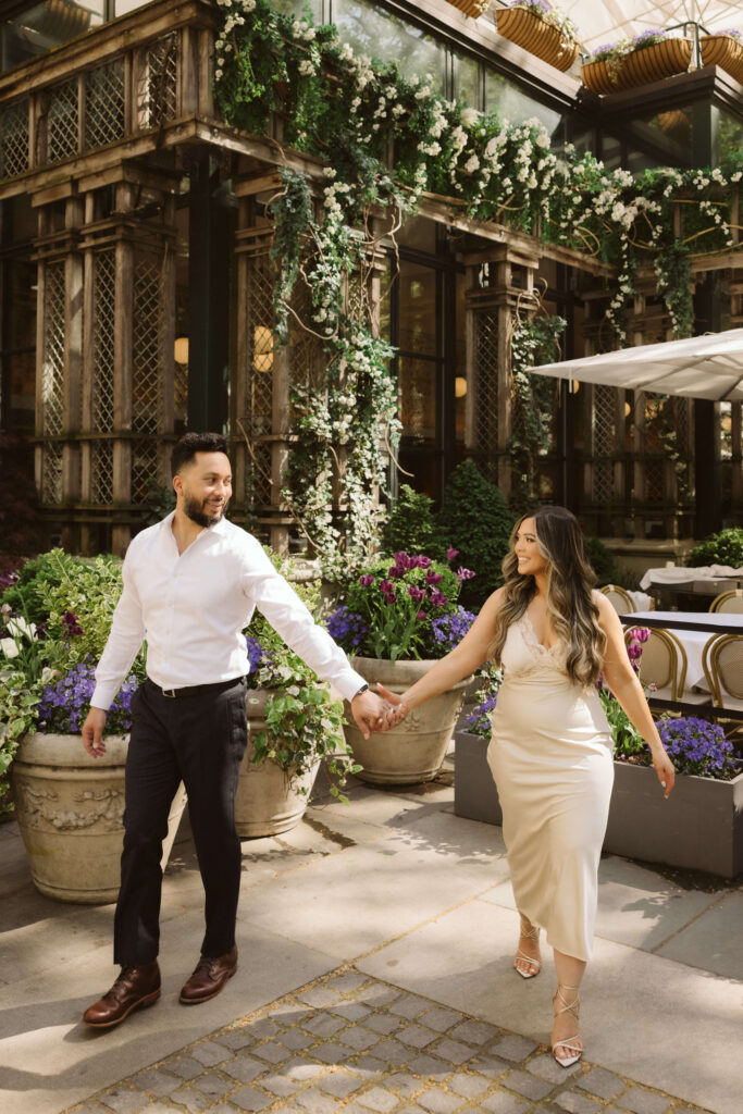 Spring engagement session by the Bryant Park Grill in Bryant Park, NYC. Photo by OkCrowe Photography.