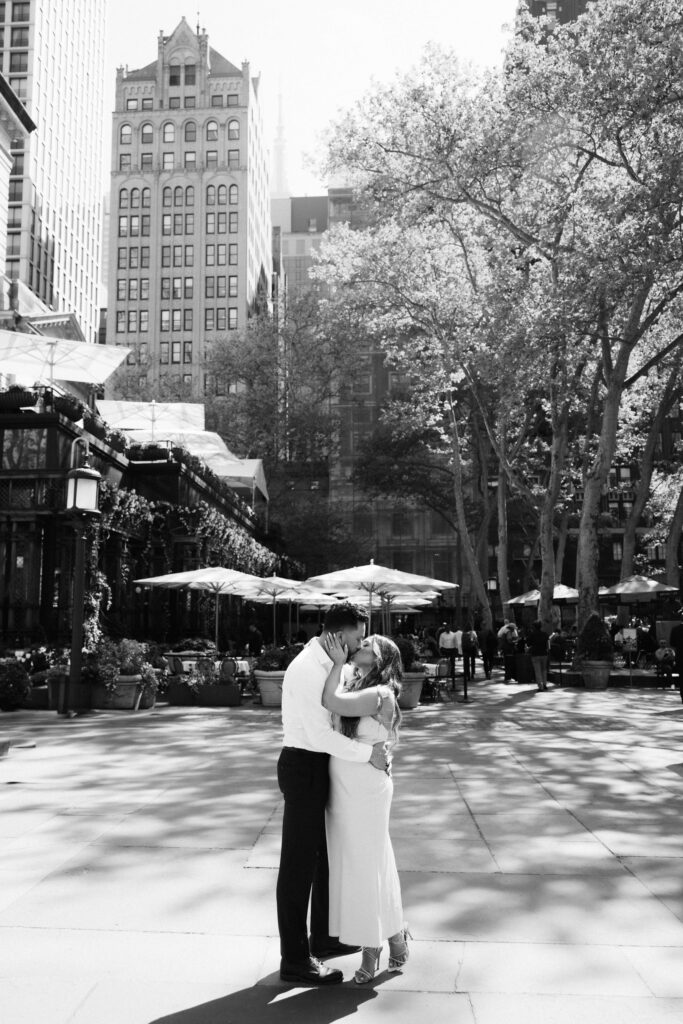 Spring engagement session by the Bryant Park Grill in Bryant Park, NYC. Photo by OkCrowe Photography.