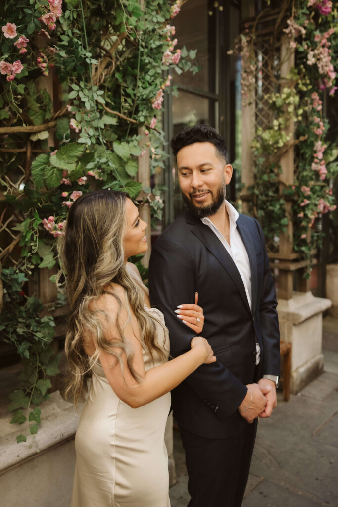 Spring engagement session by the Bryant Park Grill in Bryant Park, NYC. Photo by OkCrowe Photography.