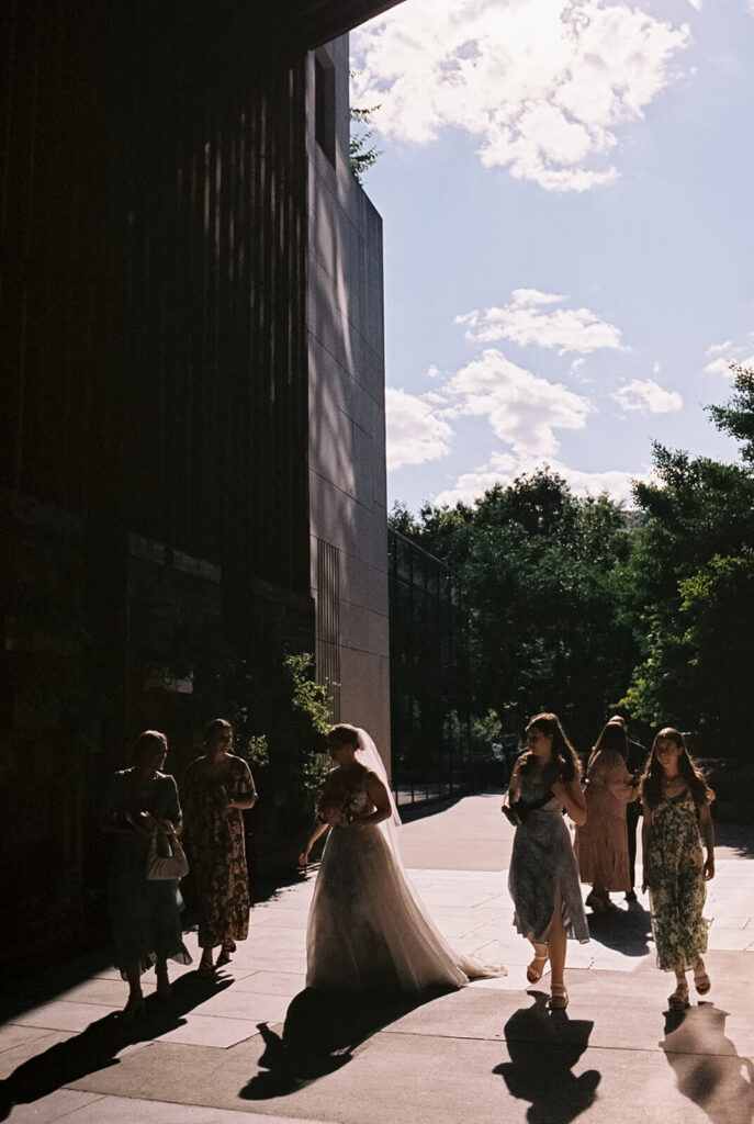 Backyard-style wedding ceremony in Frankies Spuntino's outdoor Garden space. Photo by OkCrowe Photography.